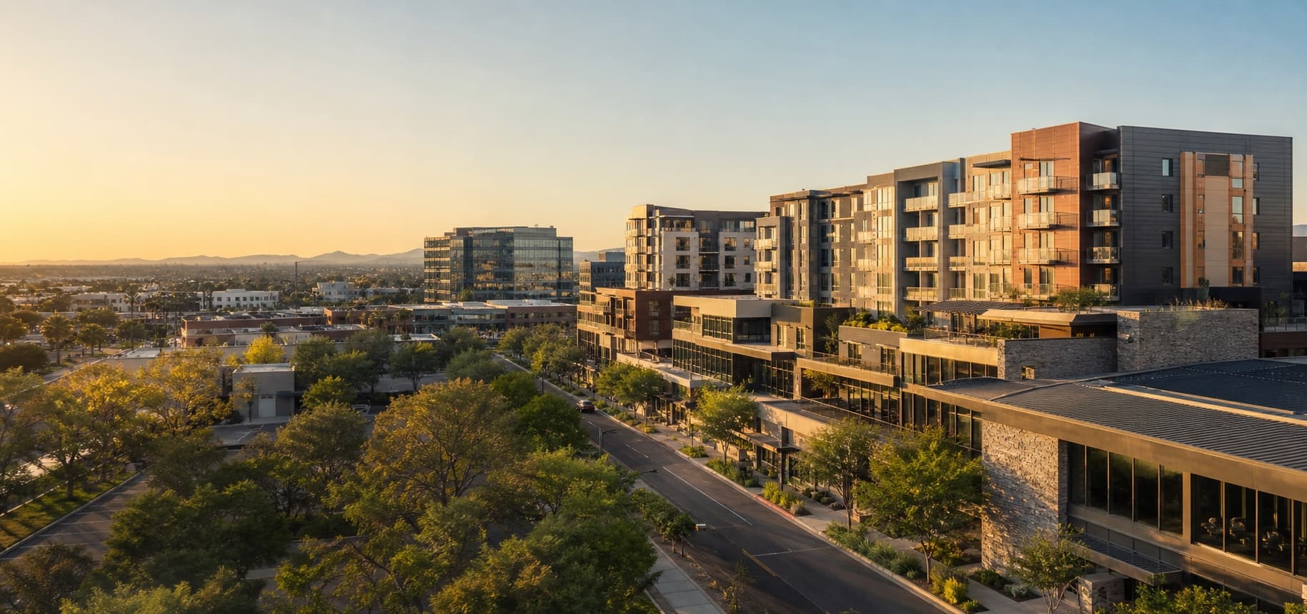 Mixed-use commercial real estate district at golden hour